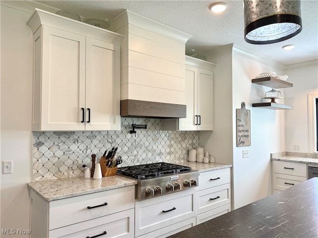 2710 E Hutton Rd, Wooster, OH 44691 - kitchen featuring stainless steel gas stovetop, backsplash, open shelves, white cabinetry, and a textured ceiling