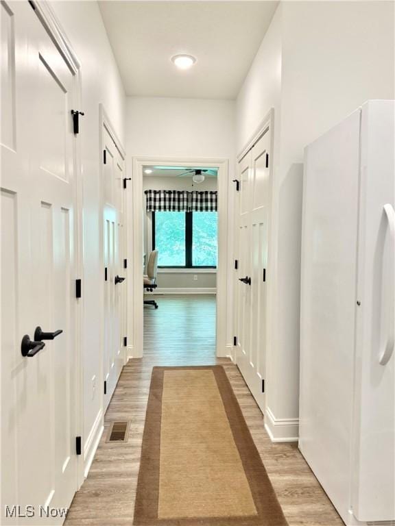 2710 E Hutton Rd, Wooster, OH 44691 - hall with light wood-style floors