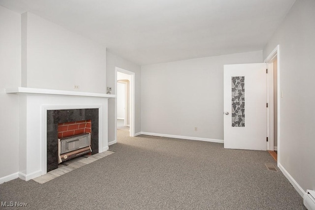 4435 W 58th St, Cleveland, OH 44144 - unfurnished living room featuring carpet flooring and a baseboard radiator