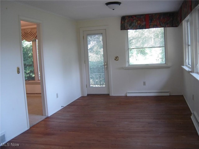 1275 NW Janet Ave, North Canton, OH 44720 - entryway with a baseboard heating unit, wood finished floors, and crown molding