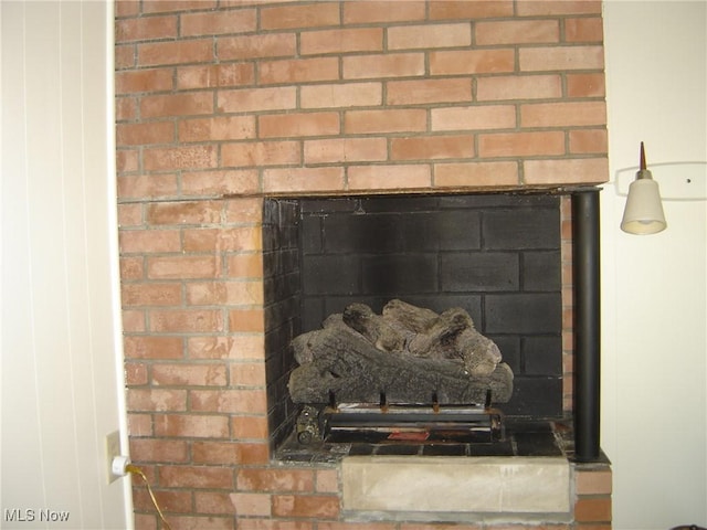 1275 NW Janet Ave, North Canton, OH 44720 - detailed view of a brick fireplace