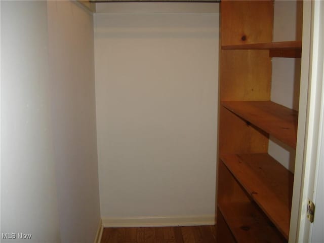 1275 NW Janet Ave, North Canton, OH 44720 - spacious closet with wood finished floors