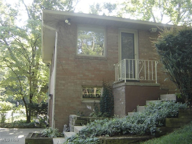 1275 NW Janet Ave, North Canton, OH 44720 - view of home's exterior with brick siding