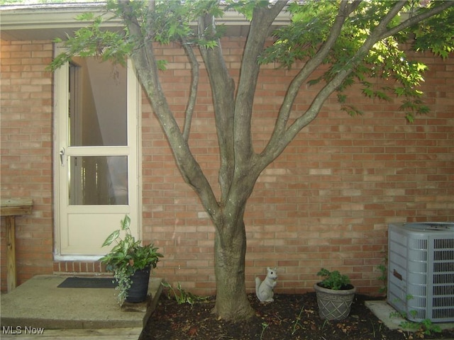 1275 NW Janet Ave, North Canton, OH 44720 - property entrance featuring brick siding