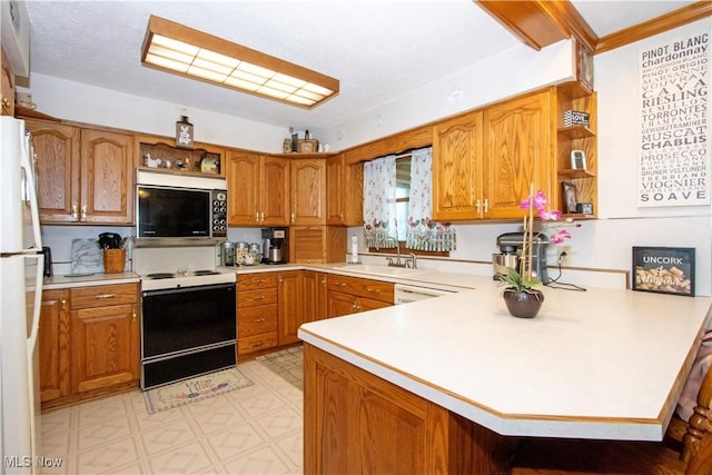 1292 Cinder Rd SE, Bergholz, OH 43908 - kitchen with white appliances, open shelves, a peninsula, light countertops, and brown cabinets