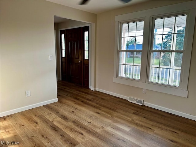 832 Meese Rd NE, Louisville, OH 44641 - foyer entrance featuring wood finished floors