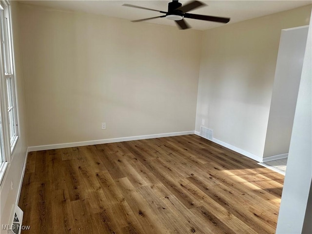832 Meese Rd NE, Louisville, OH 44641 - unfurnished room with a ceiling fan and wood finished floors