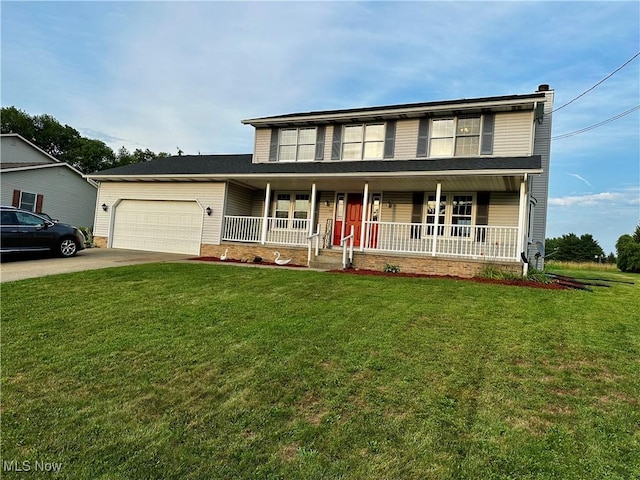 832 Meese Rd NE, Louisville, OH 44641 - view of front facade with a porch, an attached garage, driveway, and a front lawn