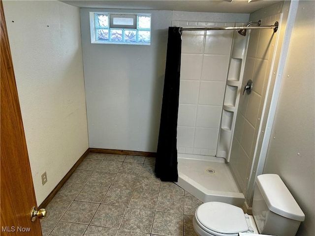 832 Meese Rd NE, Louisville, OH 44641 - bathroom featuring a stall shower and tile patterned floors