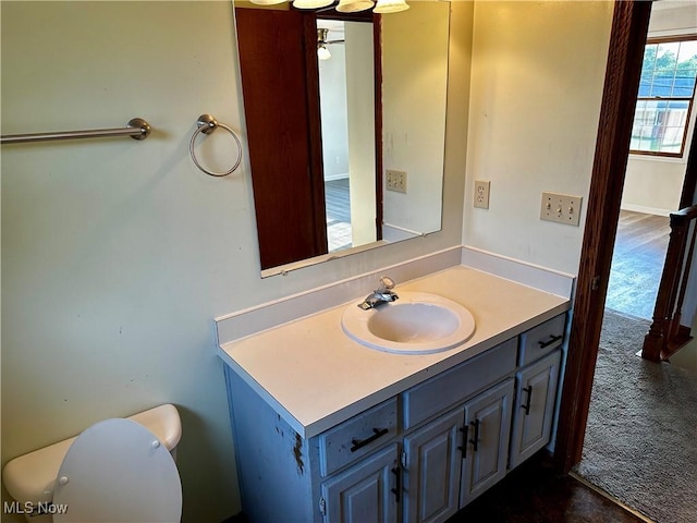 832 Meese Rd NE, Louisville, OH 44641 - half bathroom featuring vanity and toilet