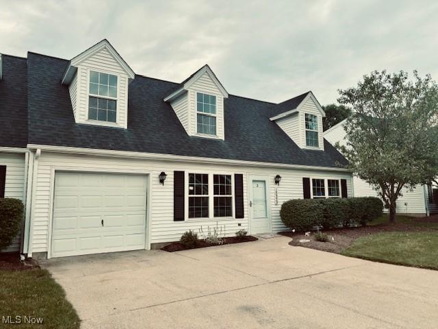 15539 Nantucket Cv # 3, Middlefield, OH 44062 - new england style home featuring concrete driveway