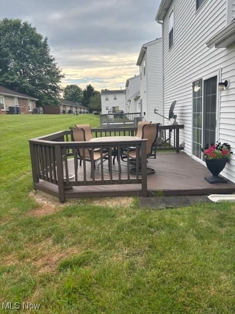 15539 Nantucket Cv # 3, Middlefield, OH 44062 - deck featuring outdoor dining space and a yard