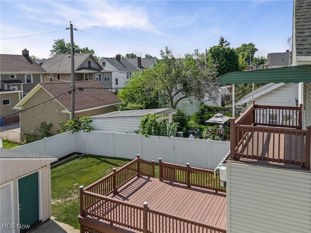 4305 W 49th St, Cleveland, OH 44144 - wooden deck with a fenced backyard and a residential view