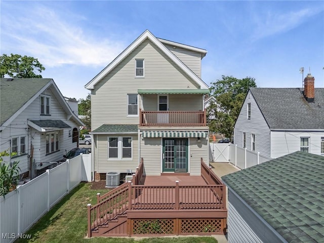 4305 W 49th St, Cleveland, OH 44144 - back of house with a fenced backyard, a deck, and a gate