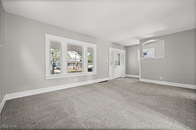 4305 W 49th St, Cleveland, OH 44144 - foyer entrance with healthy amount of natural light and carpet floors