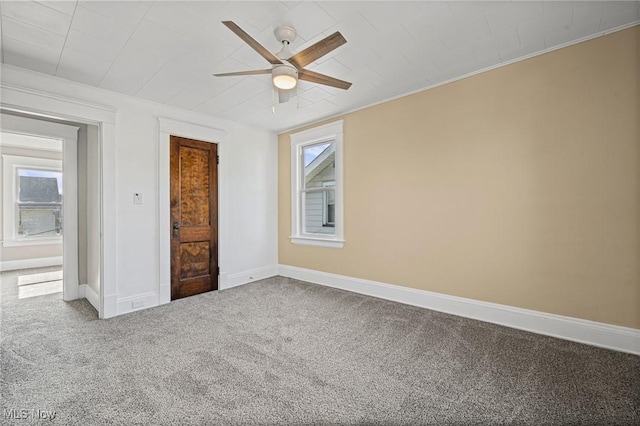 4305 W 49th St, Cleveland, OH 44144 - unfurnished bedroom with carpet, crown molding, and a ceiling fan
