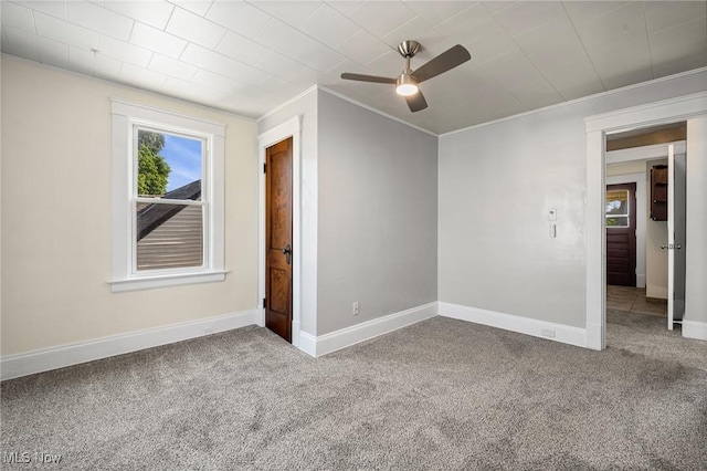 4305 W 49th St, Cleveland, OH 44144 - spare room with crown molding, carpet floors, healthy amount of natural light, and a ceiling fan