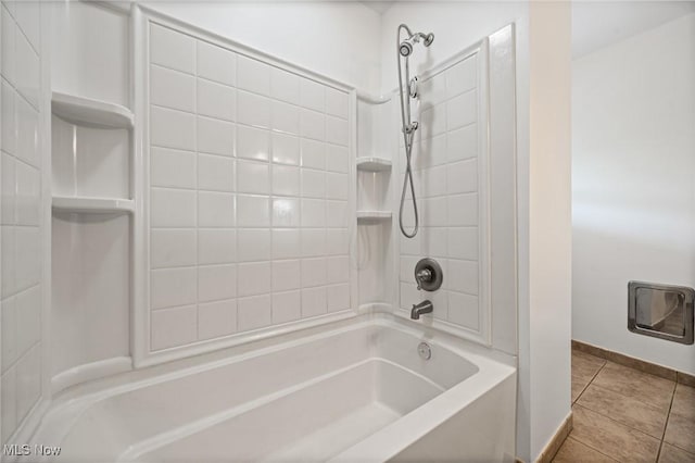 4305 W 49th St, Cleveland, OH 44144 - bathroom featuring tile patterned flooring and bathtub / shower combination