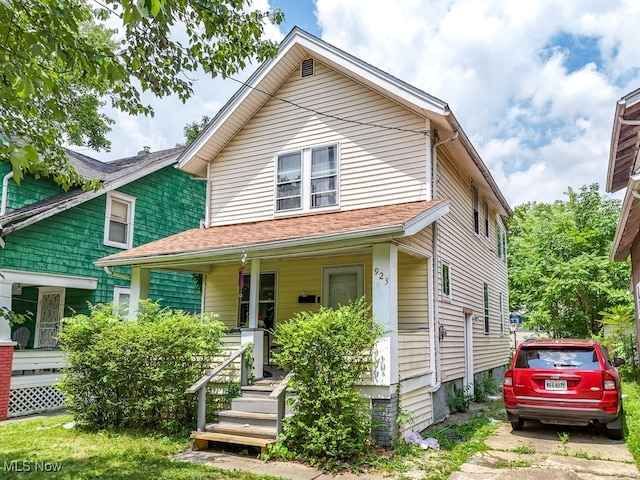 923 Lawton St, Akron, OH 44320 - view of front facade featuring a porch