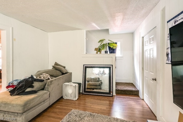 923 Lawton St, Akron, OH 44320 - living area with a textured ceiling and wood finished floors