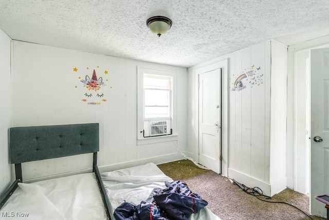 923 Lawton St, Akron, OH 44320 - bedroom featuring carpet floors, a textured ceiling, and cooling unit