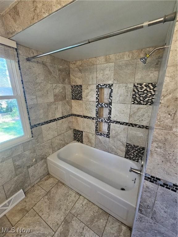 4590 Brendan Ln, North Olmsted, OH 44070 - full bathroom with washtub / shower combination and tile walls