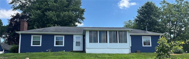 1719 Locust Ct, Wooster, OH 44691 - view of front facade with a chimney and a front lawn