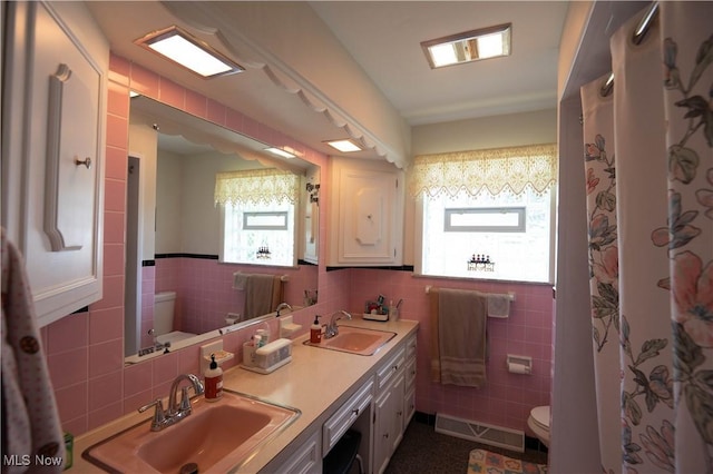 1074 S Meridian Rd, Austintown, OH 44509 - full bath with tile walls and double vanity