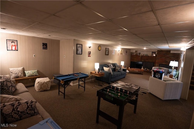 1074 S Meridian Rd, Austintown, OH 44509 - carpeted living room featuring a drop ceiling and a brick fireplace