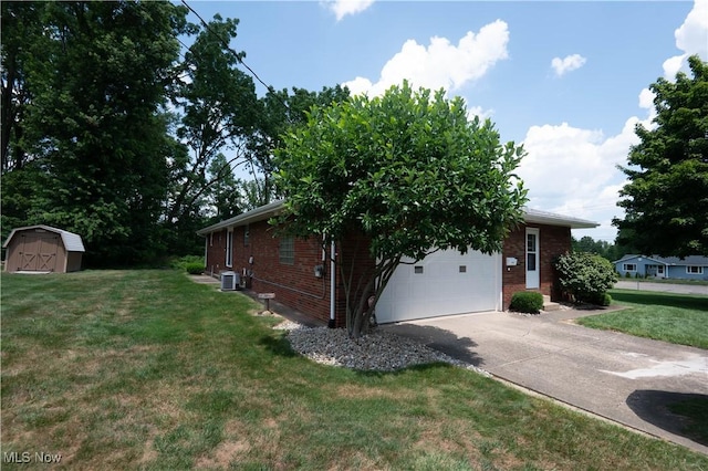 1074 S Meridian Rd, Austintown, OH 44509 - view of property exterior with brick siding, a storage shed, concrete driveway, and a lawn