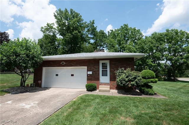 1074 S Meridian Rd, Austintown, OH 44509 - view of front of home with brick siding, driveway, a garage, and a front lawn
