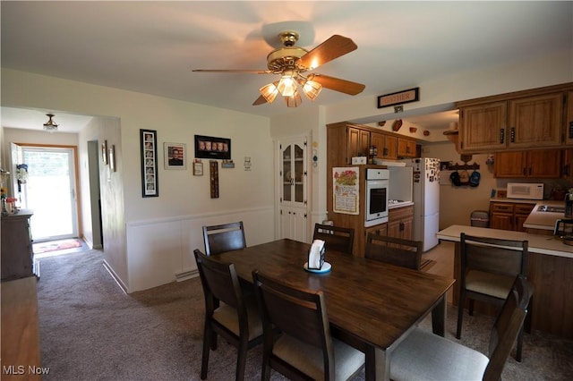 1074 S Meridian Rd, Austintown, OH 44509 - dining space featuring light colored carpet and ceiling fan