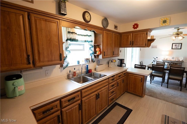 1074 S Meridian Rd, Austintown, OH 44509 - kitchen featuring light countertops, brown cabinets, a ceiling fan, and open shelves