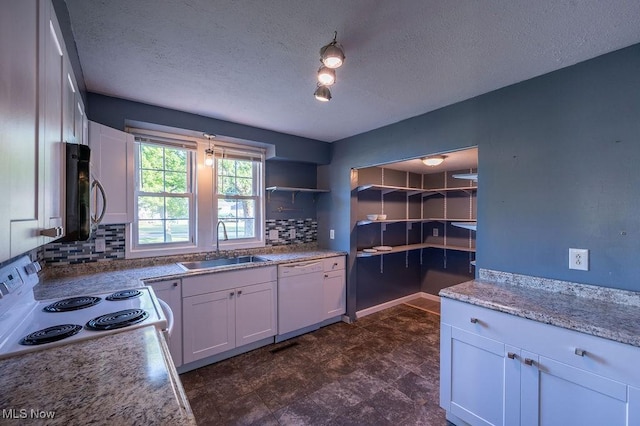 4412 14th Ave, Parkersburg, WV 26101 - kitchen featuring white appliances, white cabinets, backsplash, a textured ceiling, and open shelves