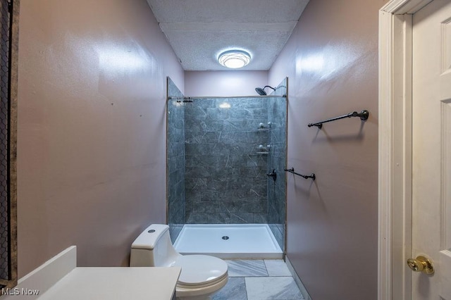 4412 14th Ave, Parkersburg, WV 26101 - bathroom with a tile shower and a textured ceiling