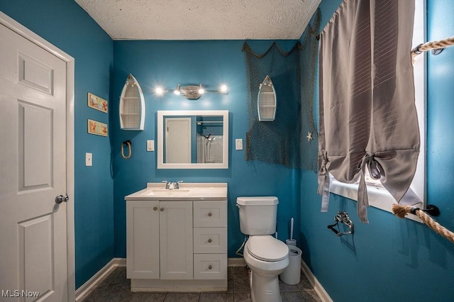 4412 14th Ave, Parkersburg, WV 26101 - full bathroom featuring vanity, tile patterned floors, and a textured ceiling