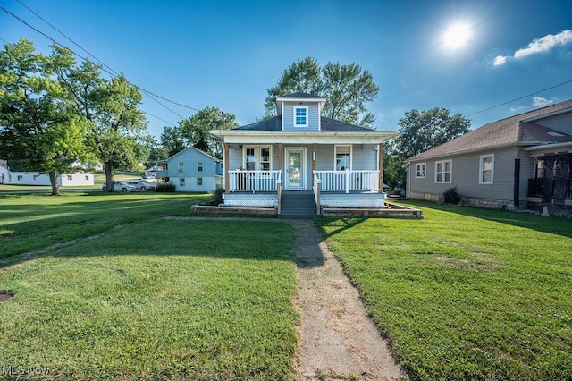 4412 14th Ave, Parkersburg, WV 26101 - bungalow with a porch and a front lawn