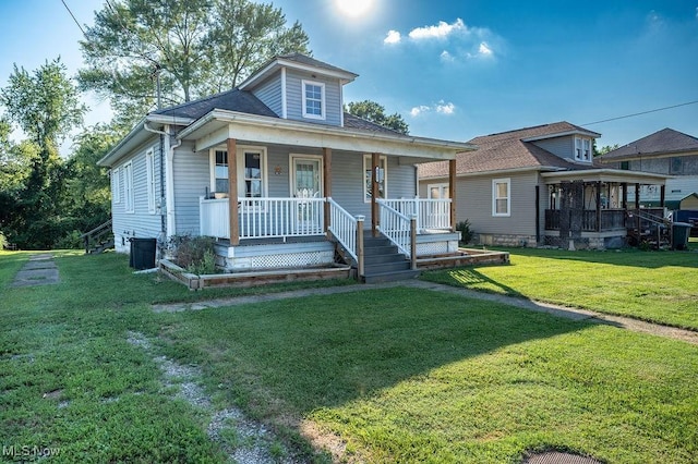 4412 14th Ave, Parkersburg, WV 26101 - bungalow-style house featuring covered porch and a front lawn