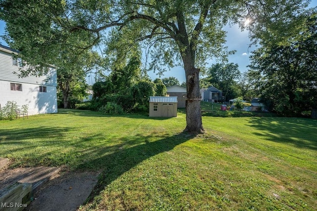 4412 14th Ave, Parkersburg, WV 26101 - view of grassy yard featuring a shed