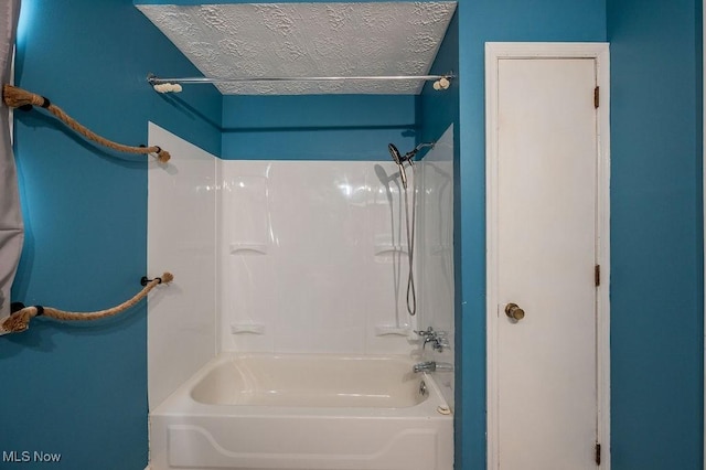 4412 14th Ave, Parkersburg, WV 26101 - bathroom with shower / bath combination and a textured ceiling