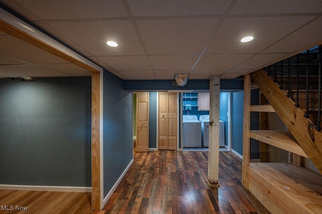 4412 14th Ave, Parkersburg, WV 26101 - hall with separate washer and dryer, a paneled ceiling, dark wood-type flooring, stairs, and recessed lighting