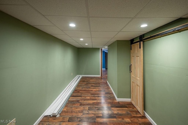 4412 14th Ave, Parkersburg, WV 26101 - corridor with dark wood-style flooring, a drop ceiling, recessed lighting, and a barn door