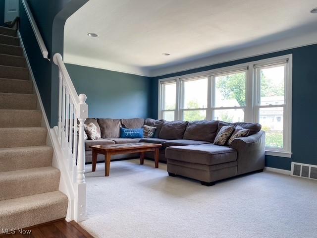 5384 Huron Rd, Lyndhurst, OH 44124 - living area featuring stairway and plenty of natural light