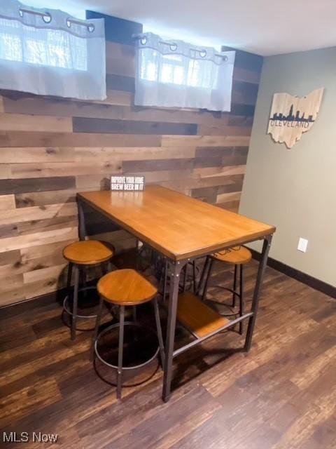 5384 Huron Rd, Lyndhurst, OH 44124 - dining area with wood walls and wood finished floors