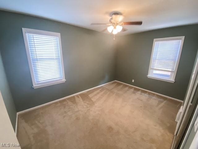5384 Huron Rd, Lyndhurst, OH 44124 - unfurnished room with ceiling fan and light colored carpet