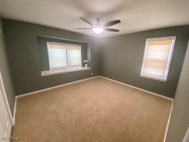 5384 Huron Rd, Lyndhurst, OH 44124 - carpeted spare room with ceiling fan and baseboards