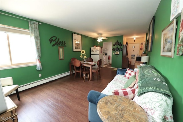 20312 Lorain Rd Unit 314, Fairview Park, OH 44126 - living area featuring baseboard heating, wood finished floors, and a ceiling fan