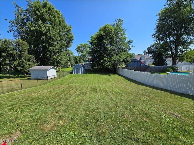 119 E 6th St, Williamstown, WV 26187 - fenced backyard with a storage shed