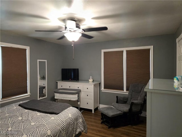119 E 6th St, Williamstown, WV 26187 - bedroom with dark wood-style flooring and a ceiling fan