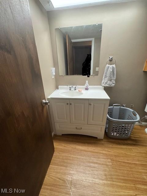 4385 Inner Circle Dr Unit B18, Brunswick, OH 44212 - bathroom with vanity and wood finished floors